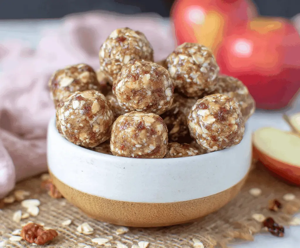 Delicious homemade apple pie energy balls with cinnamon and oats, perfect for a healthy snack or dessert