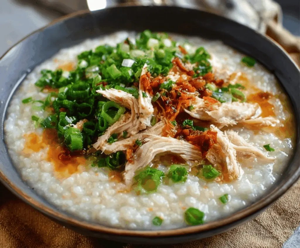 Delicious leftover Thanksgiving turkey congee served in a bowl with garnishes.